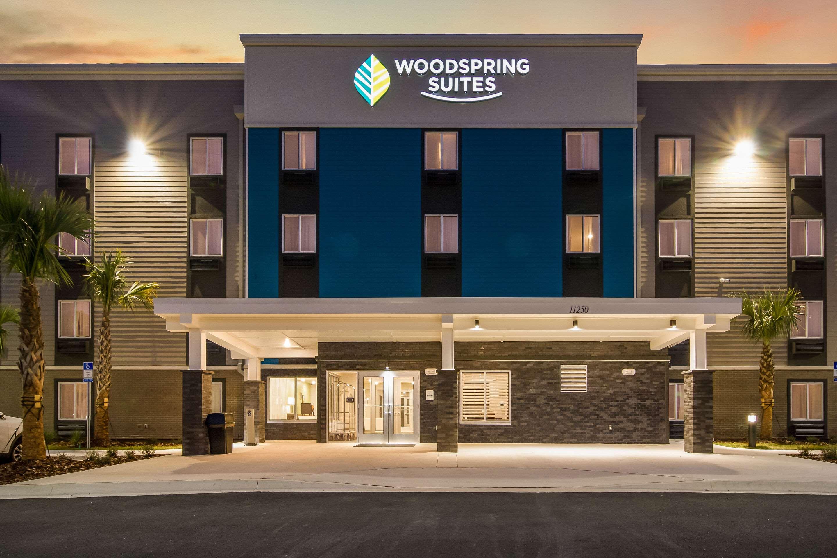 WoodSpring Suites - Merrillville | Holladay Properties