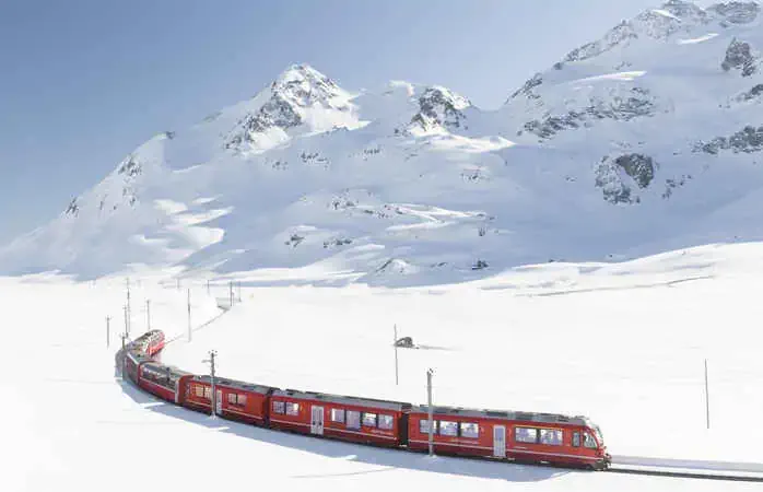 Swiss train with mountain in background